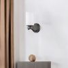 One Light Bronze and Glass Wall Sconce