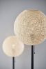 24" Antiqued Bronze Metal Candlestick Table Lamp With Off White Globe Shade
