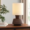 27" Distressed Brown Solid Wood Urn Table Lamp With Beige Drum Shade