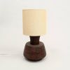 27" Distressed Brown Solid Wood Urn Table Lamp With Beige Drum Shade