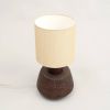 27" Distressed Brown Solid Wood Urn Table Lamp With Beige Drum Shade