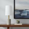 18" Gray And Antiqued Brass Concrete And Metal Table Lamp With White Drum Shade