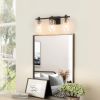 8" Black And Clear Glass Armed Sconce